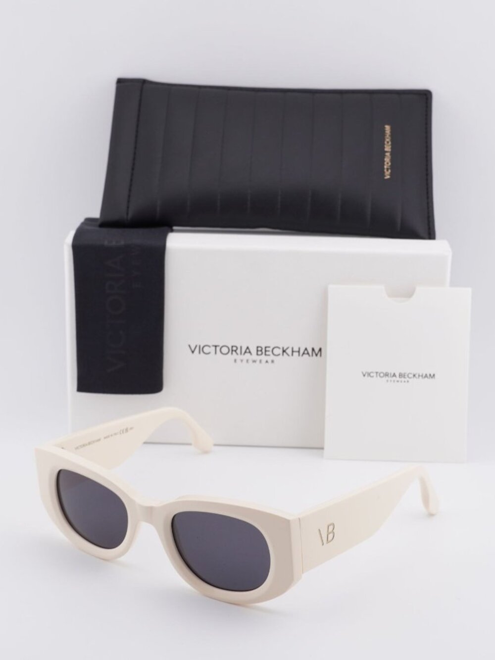 Victoria Beckham VB654S 103 Sunglasses Ivory Oval Frame, Blue Lenses
